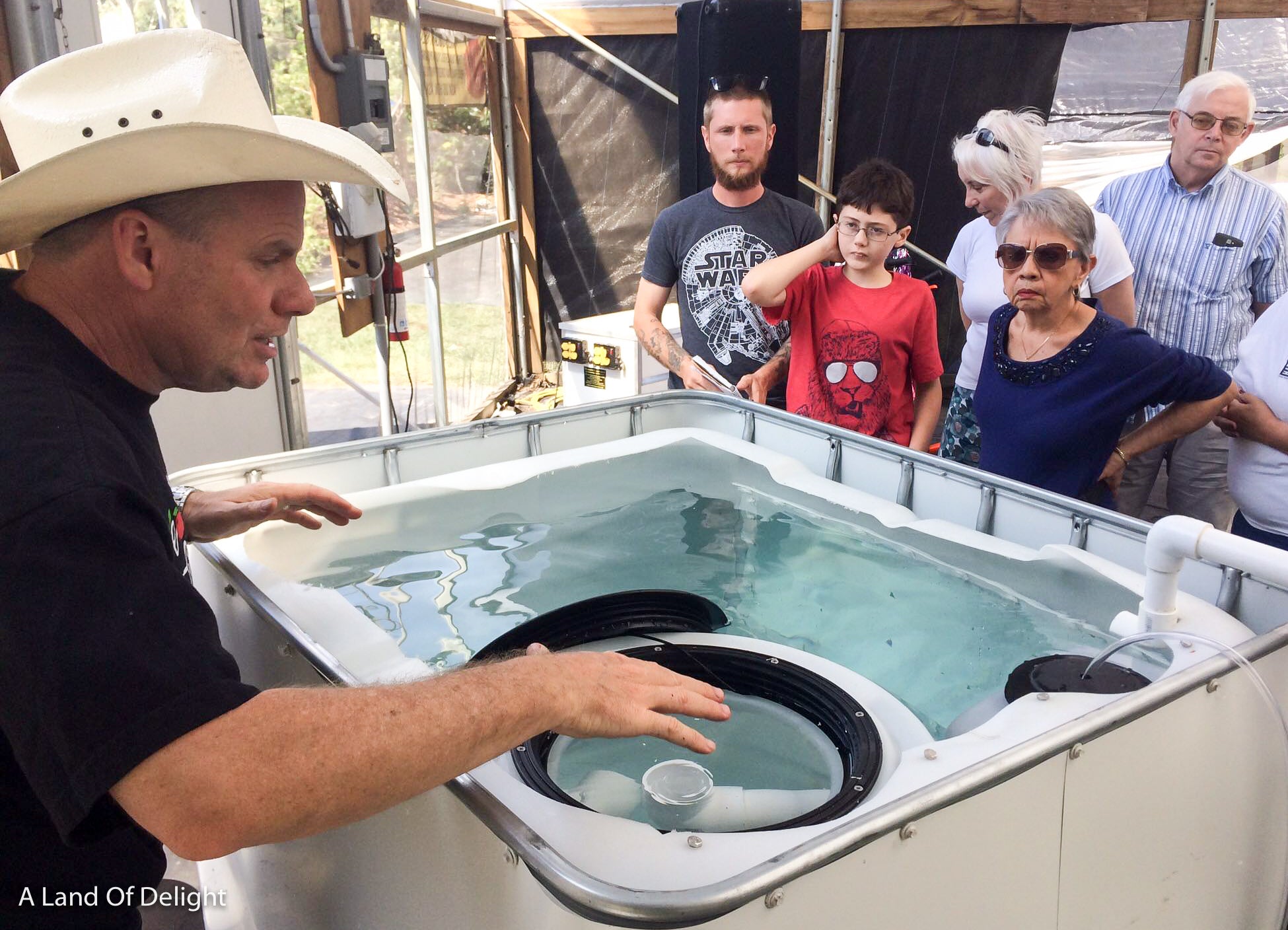 Dr. Eric Gonyon giving Aquaponics made simple class to group of people.