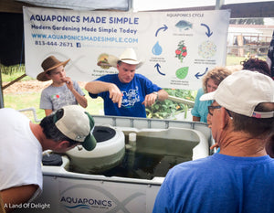 Dr. Eric Gonyon giving Aquaponics made simple class to group of people