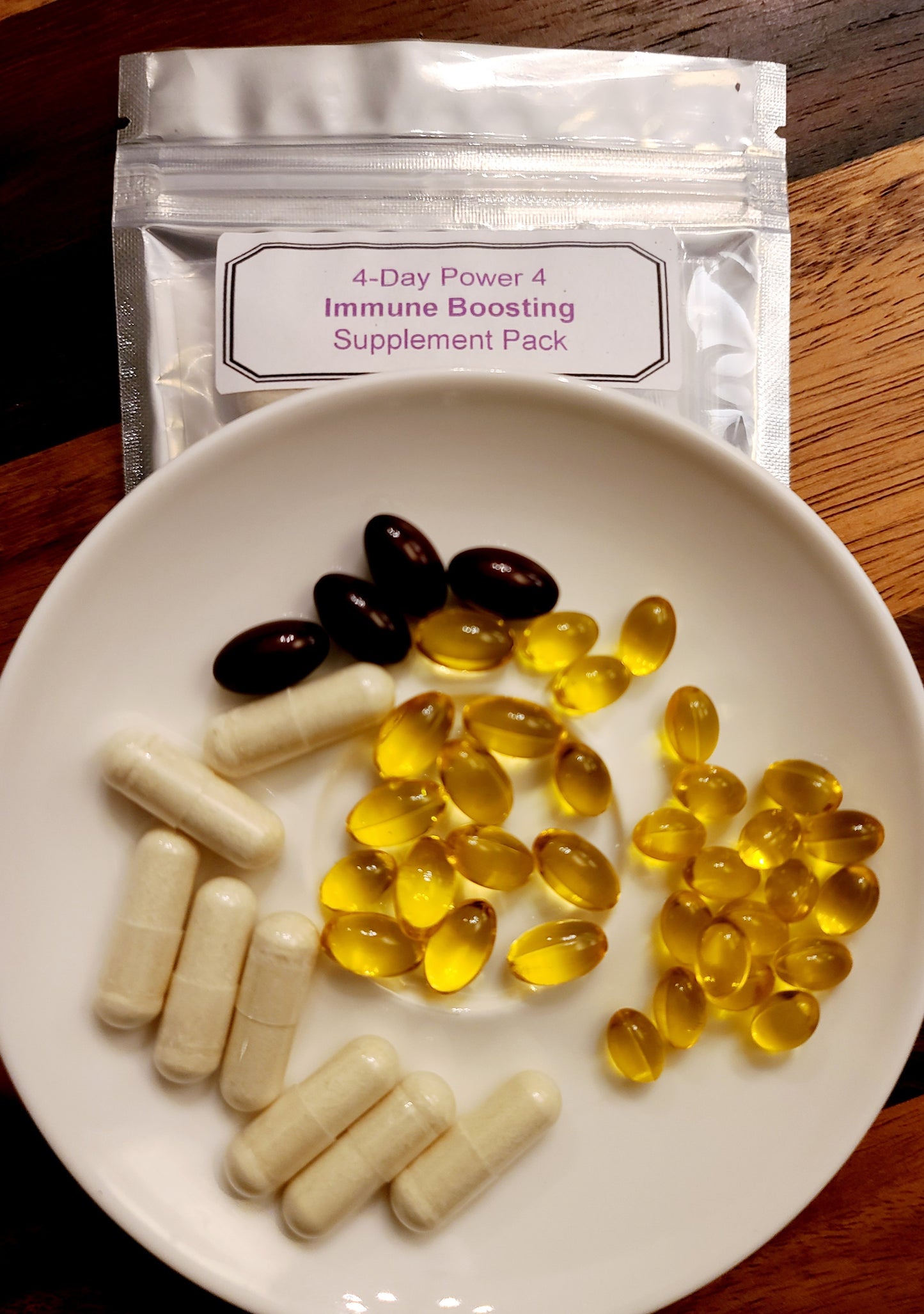 Picture of 4 Day Power 4 Immune Boosting Supplement Pack with a display of vitamins in a bowl on wooden countertop 