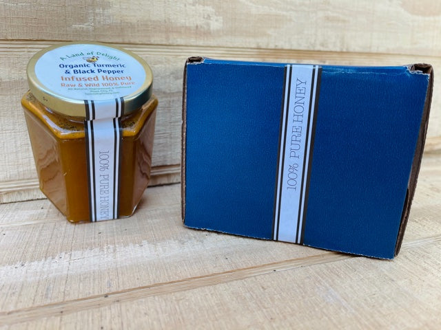 Specialty Gourmet Honey: Organic Turmeric & Black Pepper Infused Raw Honey - 12oz Jar Next to Blue Gift Box