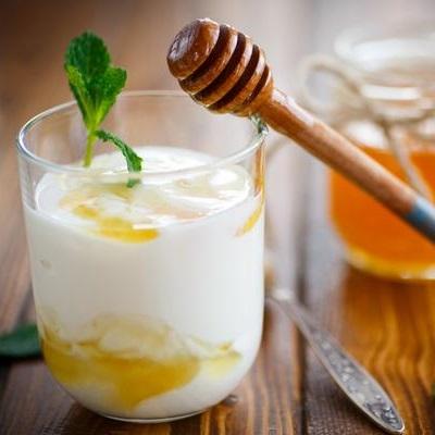 Honey Mixed into Yogurt with mint leaf